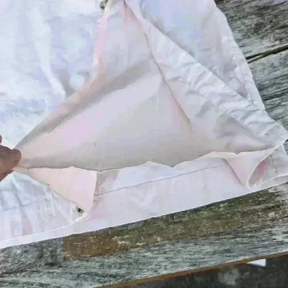 Super cute anthropology light pink linen skirt with faux thigh slit size 8